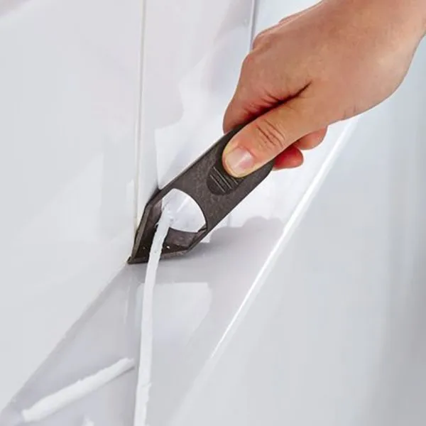 расшивка силиконового шва специальным ножом