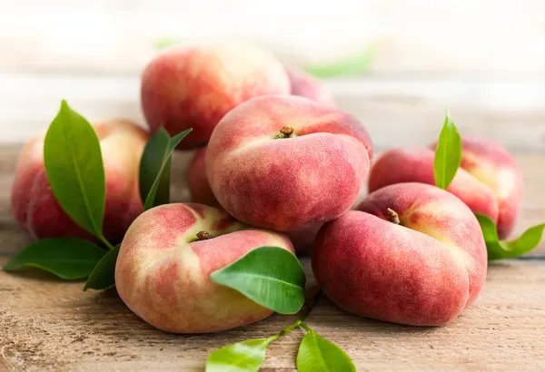 инжирный персик — полезные свойства плоского фрукта для здоровья. плоский персик как называется. 17